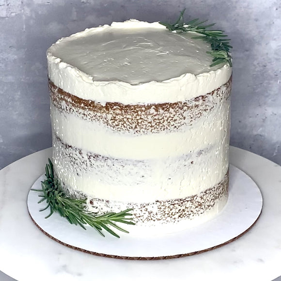 Vegan semi-naked cake decorated with greens for a rustic aesthetic made to order in Trinidad