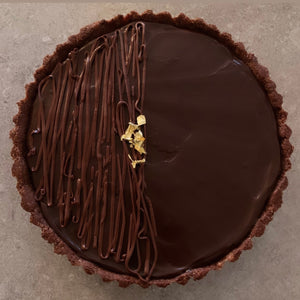 Vegan and gluten-free chocolate tart topped with gold leaf made to order in Trinidad